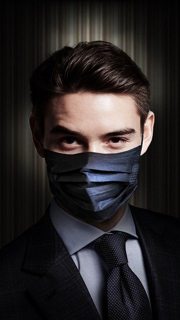 Exportar online hombre de negocios con mascarilla